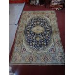 A central Persian part silk Nain carpet, the central double pendant medallion with repeating petal