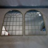 A pair of arched garden mirrors, 77 x 49cm