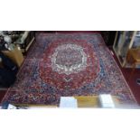 A Persian Bakhtiar Carpet, the central double pendant medallion with repeating petal motifs, on a