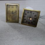 Two brass Art Deco travelling alarm clocks, one retailed at Harrods