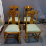 A set of four Art Deco oak dining chairs