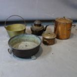 A miscellaneous collection of brass pans, pots and a kettle.