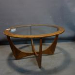 A G-plan teak 'astro' coffee table with glass top, H.45 D.84cm