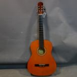 An acoustic guitar by Lauren model 100N