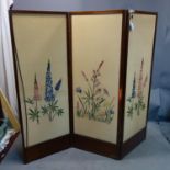 A 19th century three panel folding room screen, the panels embroidered with flowers, H.158 W.59cm (