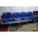 A set of four waiting room chairs, with blue vinyl seats, H.77 W.212cm