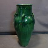 A large Persian green glazed Sharab wine vessel, H.87cm