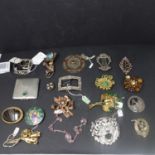 A collection of brooches, to include an Irish Gaelic silver and enamel brooch, a hallmarked silver