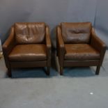 A pair of Morgensen style brown leather armchairs
