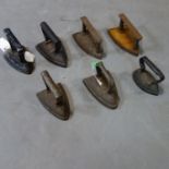 A quantity of vintage metal irons