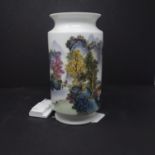 A Chinese famille rose vase, decorated with a continuous lakescape with mountains to background,
