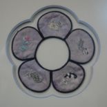 A Chinese embroidered silk Childs Collar, five petal shape with animal design, framed and glazed.