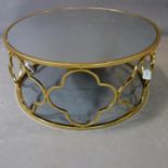 A contemporary gilt circular low table with mirrored top, H.35cm Diameter 79cm