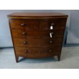 A 19th century bowfronted chest of two short over three long drawers, H.102 W.100 D.50cm