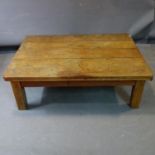 A pine coffee table, H.37 W.106 D.74cm