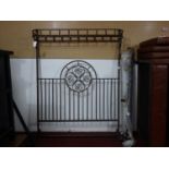 A contemporary wrought iron bed frame