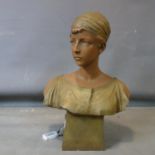 After R. Aurili, a cast plaster bust of young woman, on a tapering base, bearing signature and