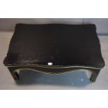 A large Chinese black coffee table with gilt highlights, H.56 W.153 D.97cm
