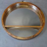 An Indian circular teak wall mirror, Diameter 61cm