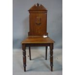 A Victorian mahogany hall chair, raised on turned legs, H.93cm