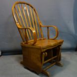 A light oak rocking chair