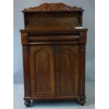 A Victorian mahogany chiffonier, with frieze drawer above two cupboard doors, on ball feet, H.128
