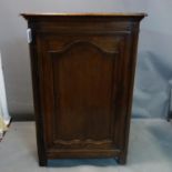 A large oak corner cabinet, H.132 W.90 D.52cm