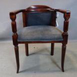 A mid 20th century beechwood tub chair, upholstered in grey fabric, on outswept tapering legs, H.