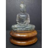 A 19th century Chinese carved purple quartz model of a seated Buddha, H.13cm