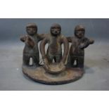 A Pre-Columbian style pottery sculpture of 3 figures, H.18cm