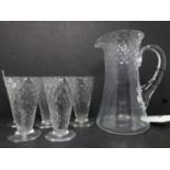 A 20th century glass lemonade set comprising of a jug and 5 matching glasses