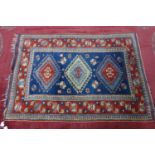 A Turkish rug with geometric designs, 188 x 130cm