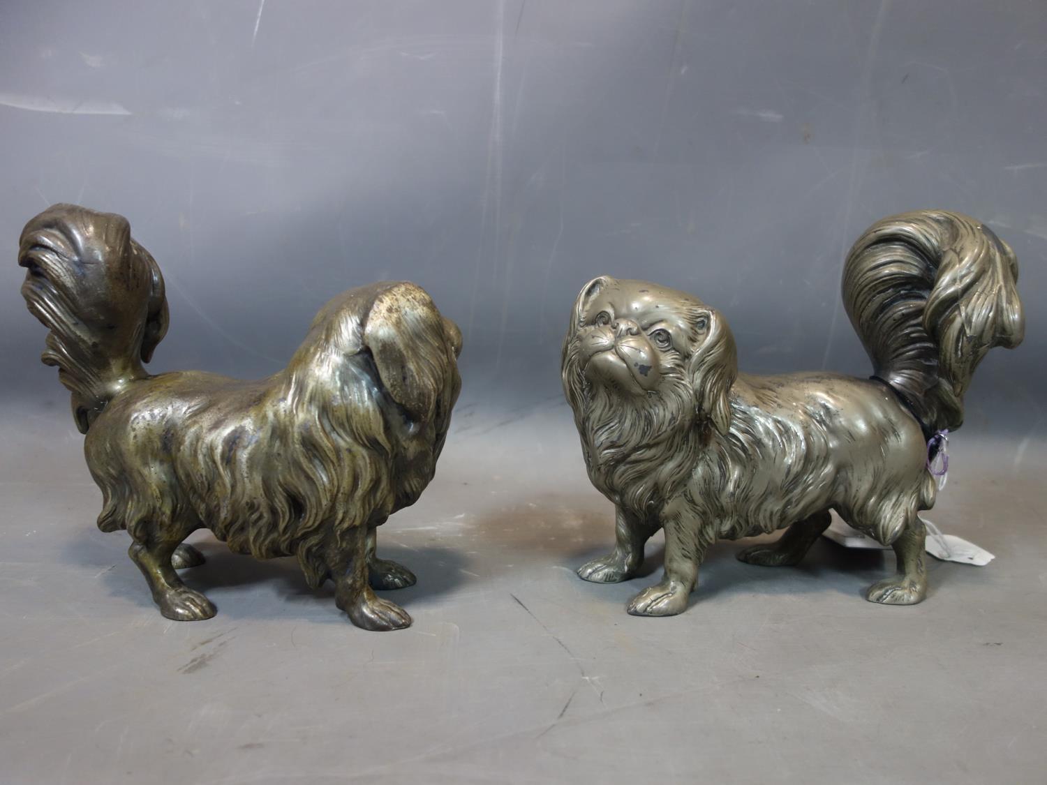 A pair of spelter Tibetan Spaniels, H.21 W.22 D.11cm - Image 2 of 2