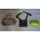 Three Prada bags