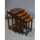 A 20th century Chinese hardwood nest of 4 tables, H.65 W.47 D.33cm