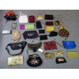 A collection of ladies purses, wallets and bumbags, some leather