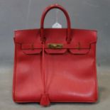 A Hermes style handbag