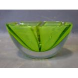 A 20th century heavy green art glass vase, H.18 W.30 D.16cm