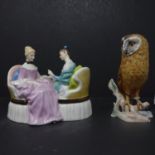 A Royal Doulton figural group of two seated ladies, 'Heart to Heart', marked to base, H.13 W.17 D.