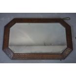 An early 20th century oak mirror with bevelled plate, 82 x 52cm