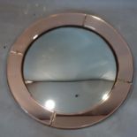An early 20th century French Art Deco convex mirror, with bevelled peach glass border, c.1930,