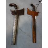Two Indonesian Javanese Kris daggers, one having white metal clad scabbard, both 44cm
