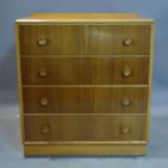 A 20th century teak and oak chest of drawers by Meredew, H.84 W.76 D.47cm