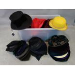 A large various collection of designer hats