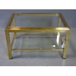 A 20th century brass and glass rectangular table, on square legs, H.43 W.70 D.51cm