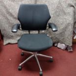 A Humanscale Freedom swivel office chair, with maker's mark