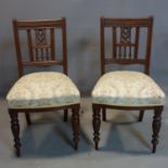 A pair of Edwardian mahogany dining chairs