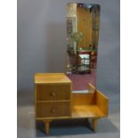 A 20th century teak and oak dressing table by Meredew, H.142 W.78 D.45cm