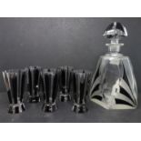 An Art Deco design crystal decanter and 5 matching glasses