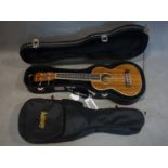 An Ashbury ukulele, model no. AU80C, serial no. 16082083, in Kinsman hard case, together with